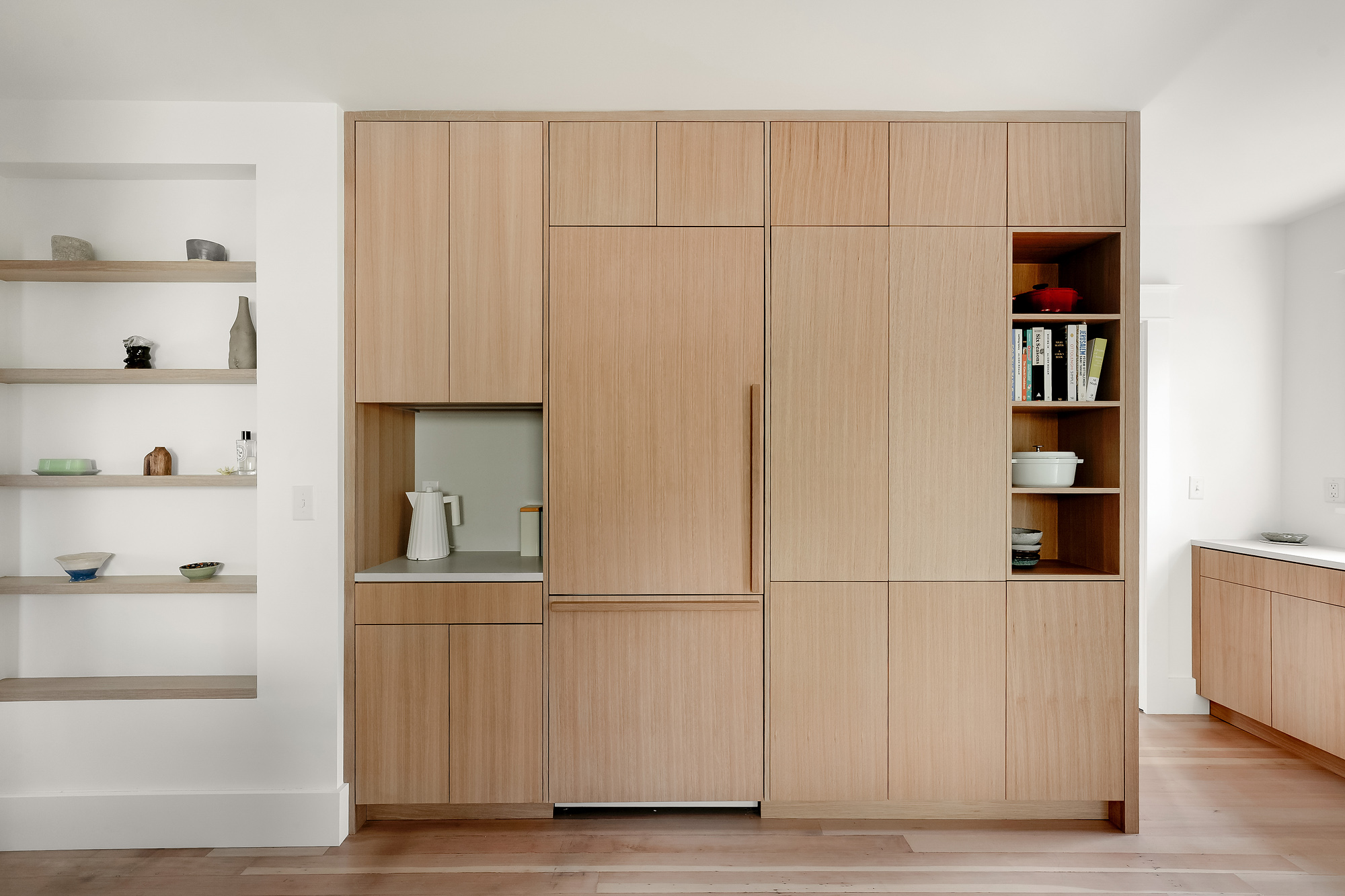 Full-height cabinet wall with panel-ready refrigerator and integrated storage, Alameda Kitchen by Tweto Architecture