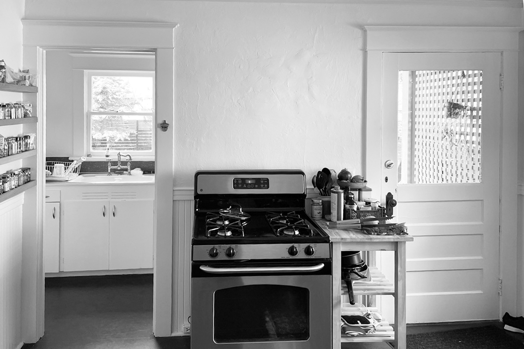 Existing kitchen before remodel showing divided layout and poor flow, Alameda Kitchen by Tweto Architecture