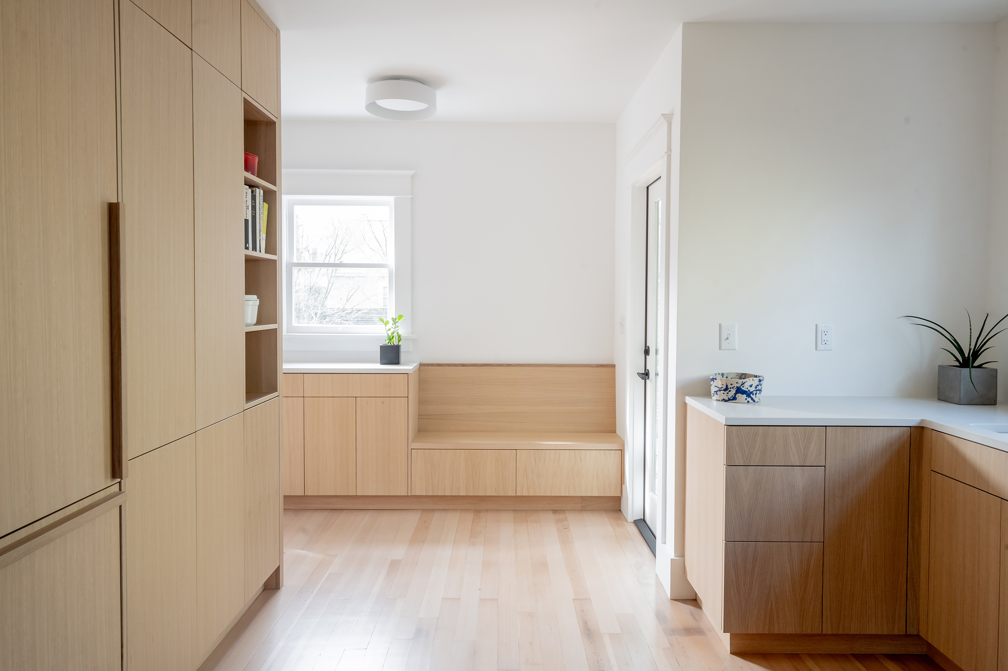 Remodeled kitchen with white oak cabinets, lime plaster backsplash, and U-shaped layout, Alameda Kitchen by Tweto Architecture