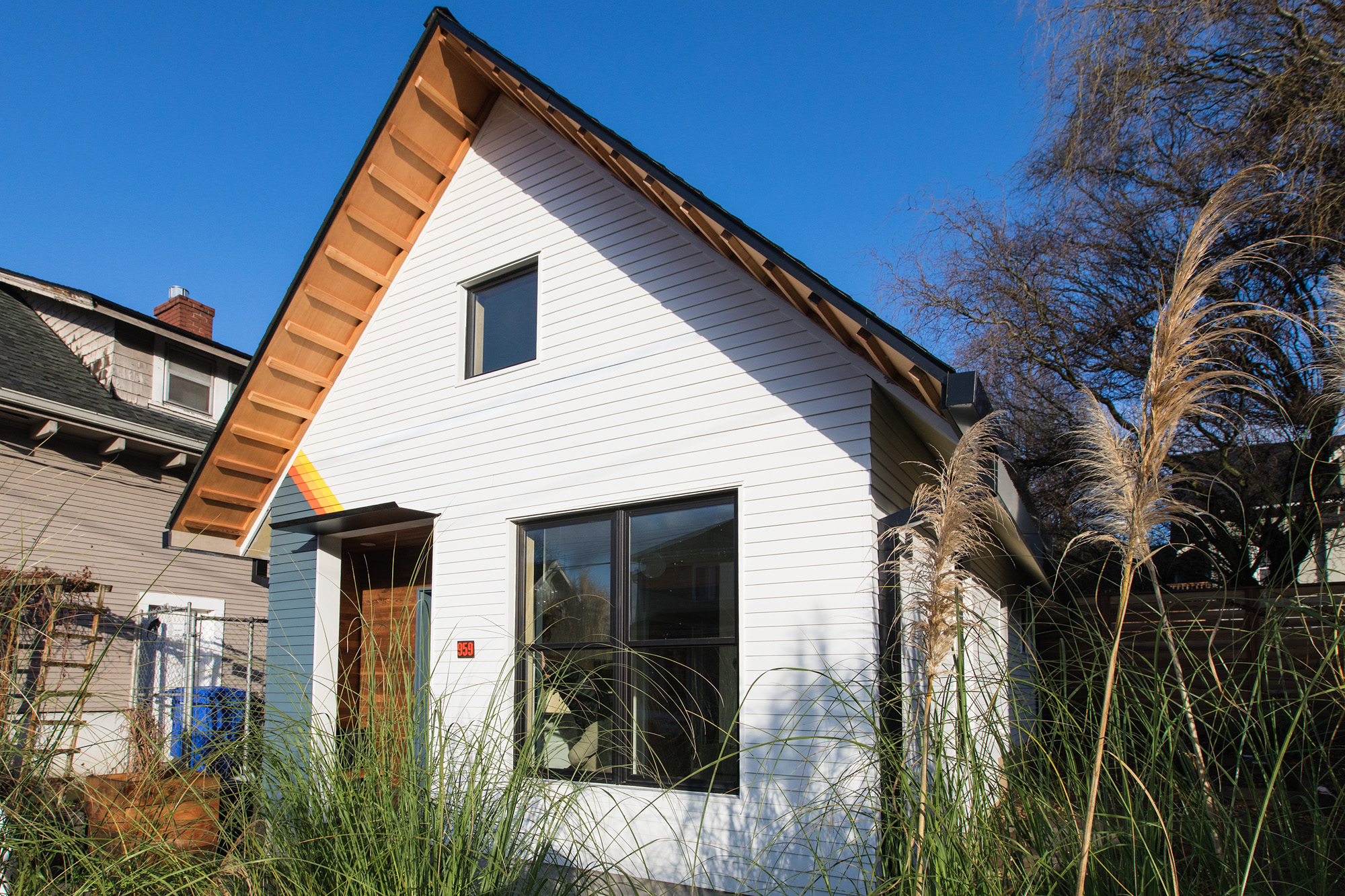 Mason Street ADU from the street side, steeply pitched gable with fir eave and fiber cement siding, NE Portland, by Tweto Architecture