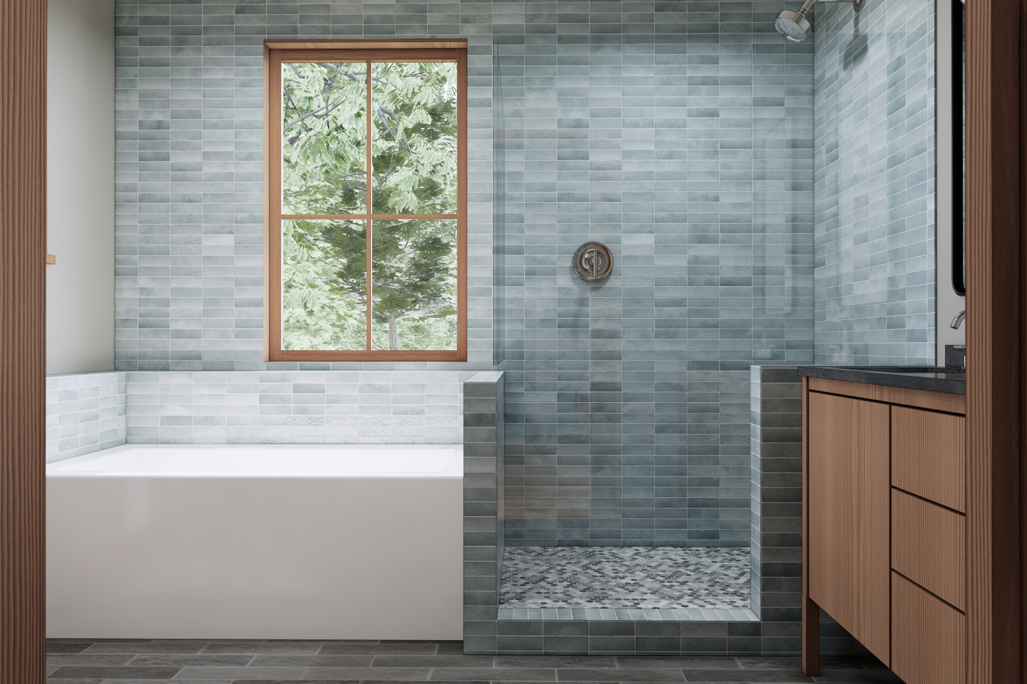 Primary bathroom with soaking tub below a tree-view window, walk-in tile shower with pebble floor, and wood vanity, Mountaindale Home by Tweto Architecture