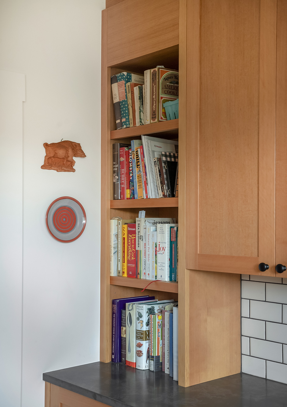 Built-in cookbook shelf close-up, Sabin Kitchen kitchen remodel by Tweto Architecture, NE Portland
