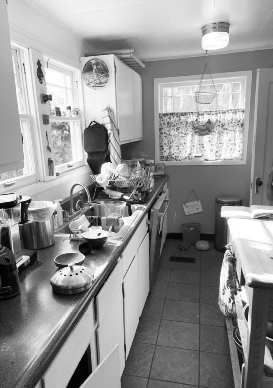 Existing galley kitchen before remodel with cramped layout and outdated painted cabinets, Sabin Kitchen by Tweto Architecture